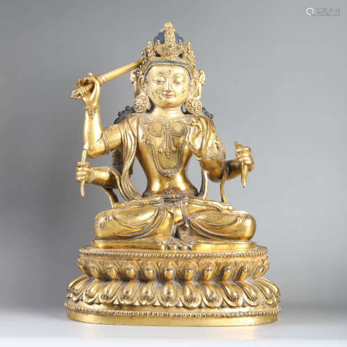 A Gilt bronze Statue of Manjusri Bodhisattva holding sword