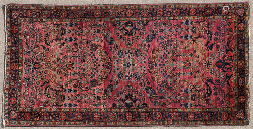 A PAIR OF ORIENTAL RUGS