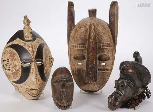 CARVED AFRICAN MASKS