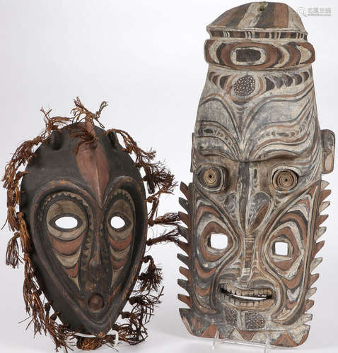 PAIR OF CARVED ETHNIC MASKS