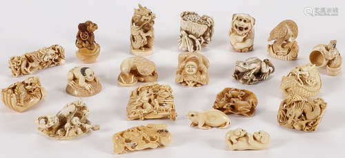 20 CHINESE OR JAPANESE CARVED NETSUKES