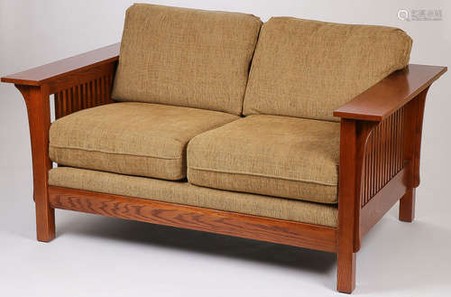 AN ARTS AND CRAFT STYLE SOFA