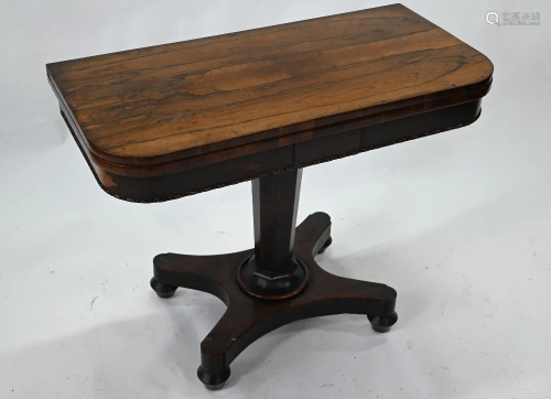 A Victorian rosewood fold-over card table