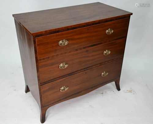 A 19th century three drawer mahogany chest
