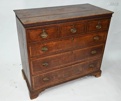 An 18th century oak chest of three short over three