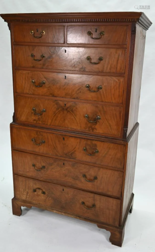 A George III walnut chest on chest