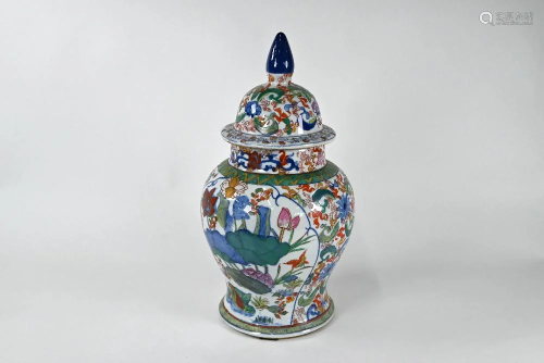 A modern decorative Chinese wucai jar and domed cover,
