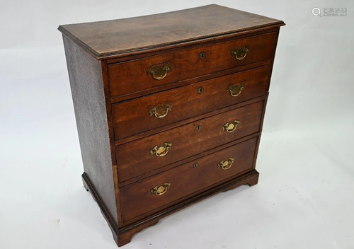 An 18th century oak chest of four long graduated