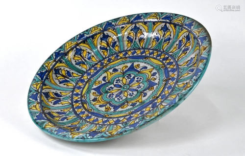 A 19th century Iznik tin-glazed bowl, 37 cm diameter