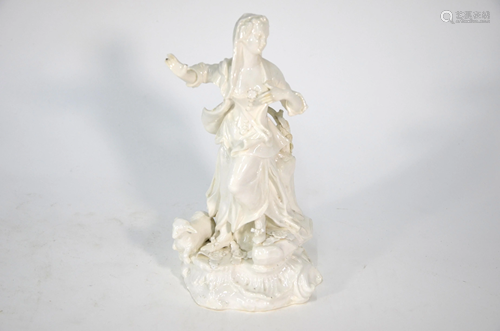 A white-glazed porcelain figure of an 18th century