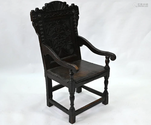 A 17th century oak wainscott chair