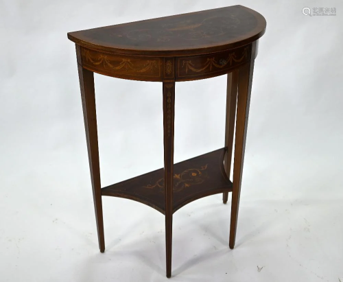 A small antique demi lune side table
