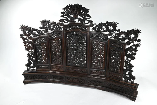 A decorative Chinese hardwood five-panel 'dragon' table