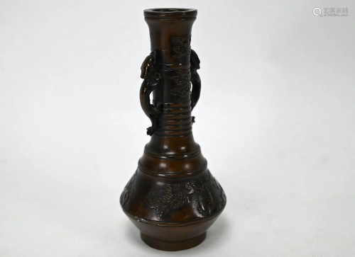 An early 20th century small Japanese bronze vase with