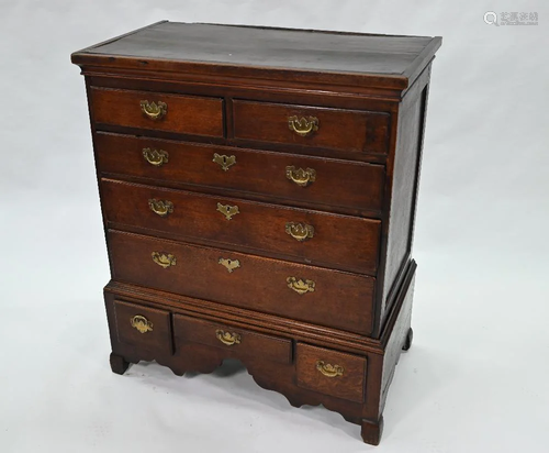 An 18th century oak chest on stand