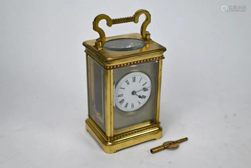 A brass cased carriage clock