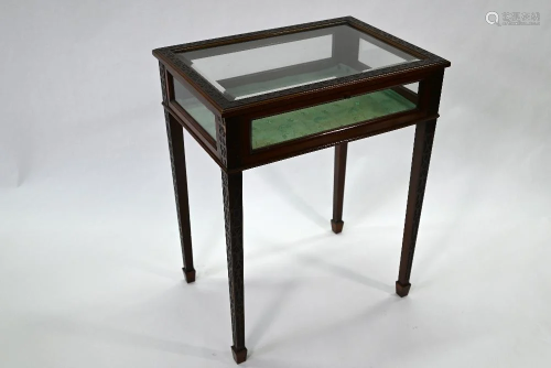 A Chippendale style vitrine table