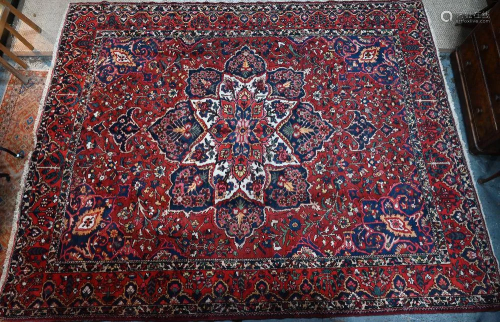 A Persian Bakhtiari carpet, 410 cm x 330 cm