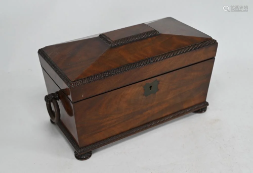 A Regency mahogany sarcophagus shaped twin compartment