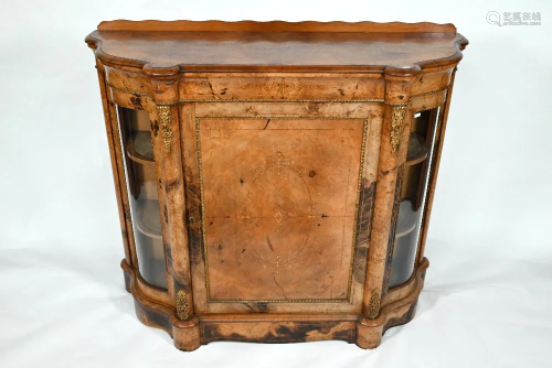 A Victorian gilt-metal mounted walnut cabinet of