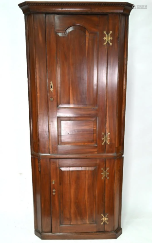 A late 18th /early 19th century fruitwood standing