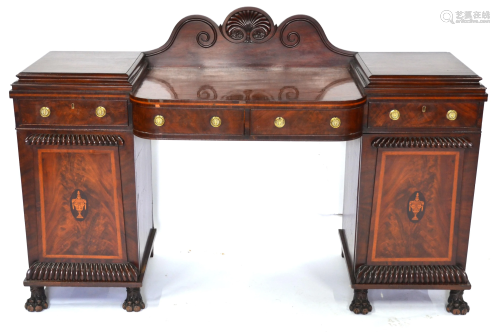 A Regency flame mahogany pedestal sideboard