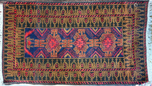 A Belouch rug, brown/red,
