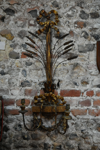 A pair of gilded twin arm wall lights with ears of corn