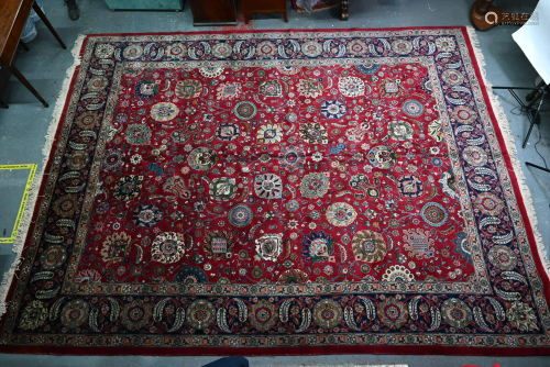 A large Persian Tabriz carpet, 430 cm x 343 cm