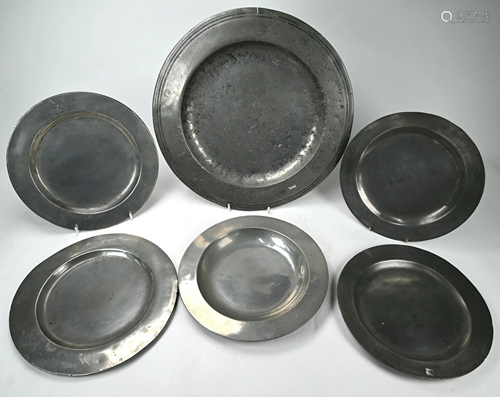 Six antique pewter plates