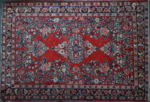 An old Persian Hamadan rug, 179 cm x 134 cm
