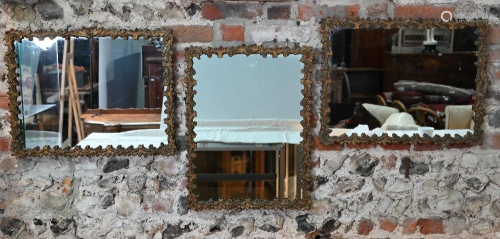 A trio of moulded gilt framed mirrors