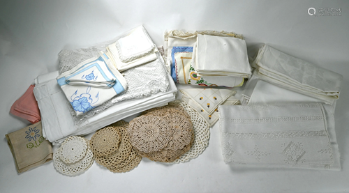 A mixed box of mostly white table linens