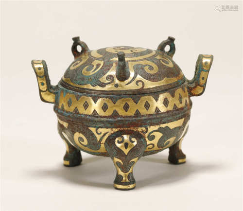 A CHINESE BRONZE TRIPOT DING VESSEL