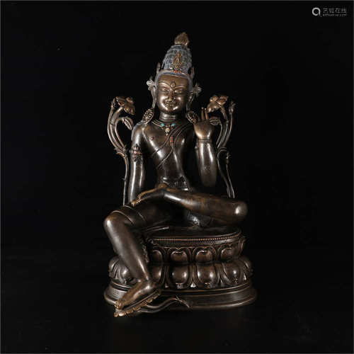 A CHINESE COMPOUND METAL BUDDHA STATUE