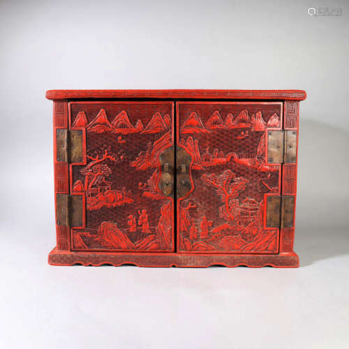 A CHINESE HAND-CRAFTEDED CINNIBAR CABINET