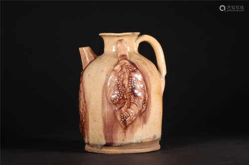 A CHINESE POTTERY KETTLE OR PITCHER