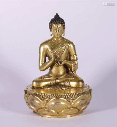 A CHINESE GILDED BRONZE BUDDHA STATUE