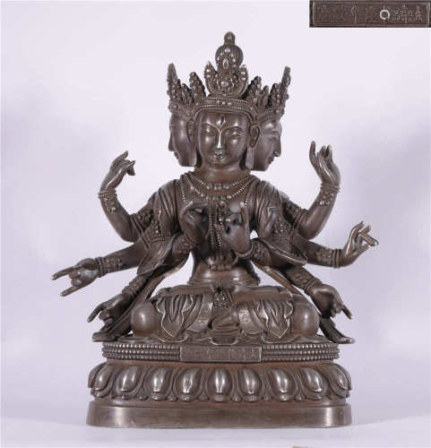 A CHINESE SILVER BUDDHA STATUE