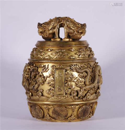 A GILDED BRONZE CHIME OR BELL