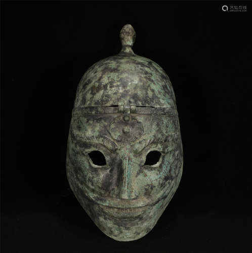 AN ARCHAEOLOGY STYLE BRONZE MASK