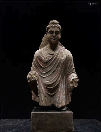 A VINTAGE BUDDHA STONE STATUE