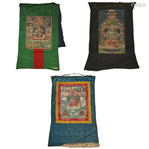 Three Tibetan Thangka Paintings.