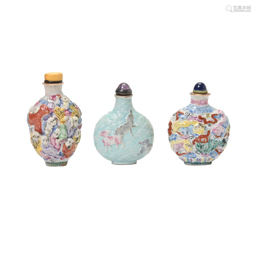 Three Molded Famille Rose Snuff Bottles.