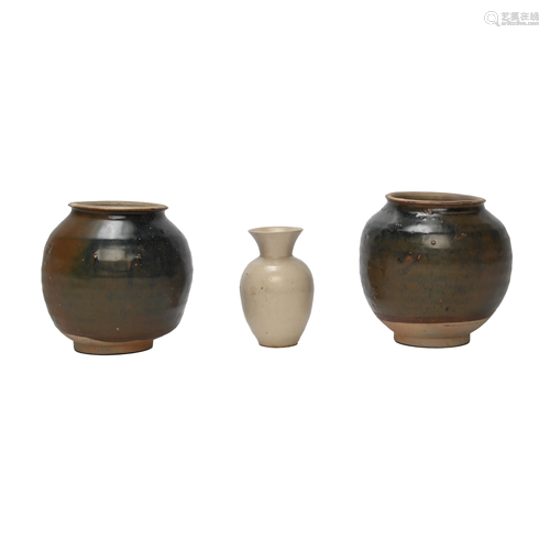 A Pair of Chinese Brown Glaze Jars.