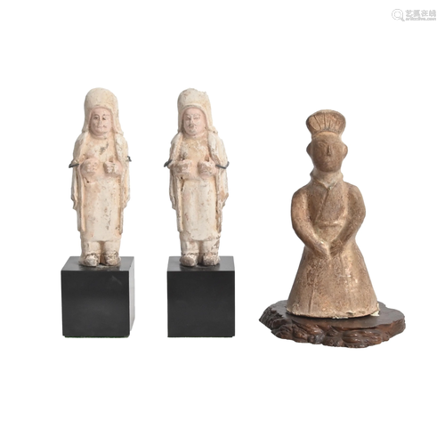 Three Han Pottery Figures on Stands.