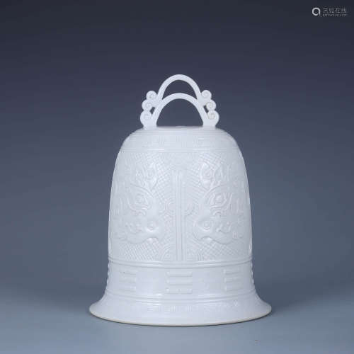 A White-Glazed Incised Kui Dragon Bell