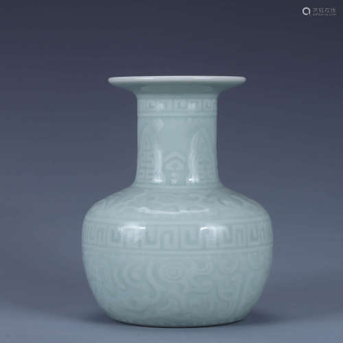 A Celadon-Glazed Incised Kui Dragon Foliated-Month Vase