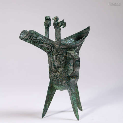 A Bronze Bird Tripod Wine Vessel