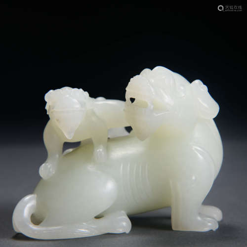 A Carved White Jade Beasts Ornament